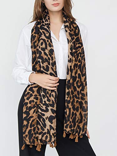Leopard print scarf wrap with short tassels, draped over a white blouse.