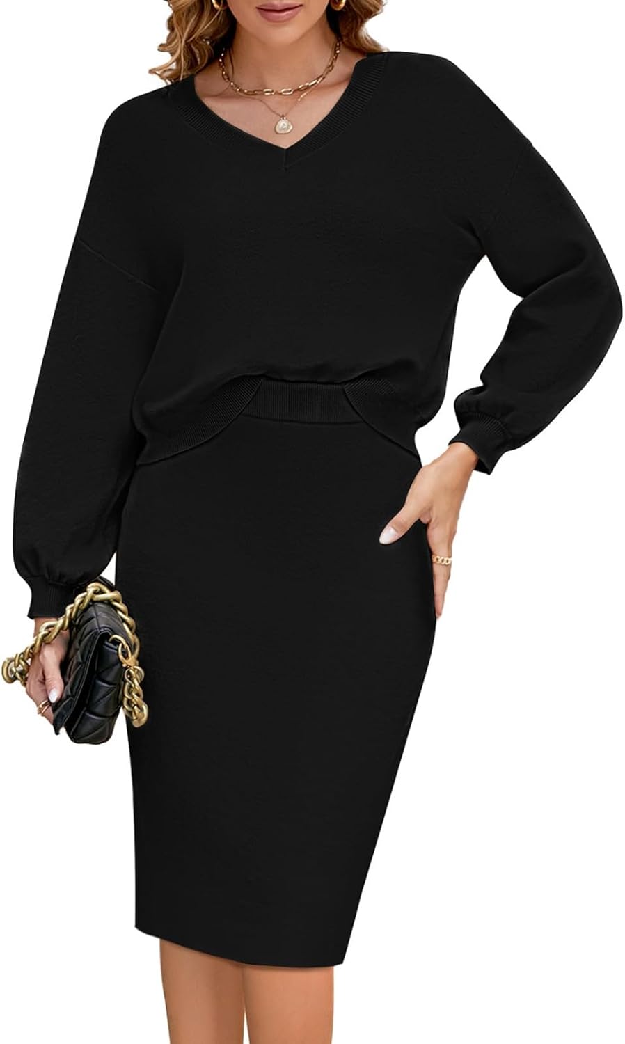 Black knit V-neck batwing top and bodycon midi skirt, two-piece sweater outfit.