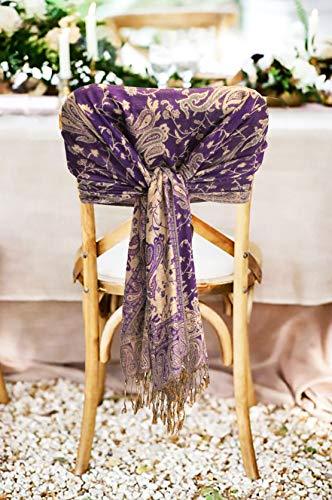 Purple paisley pashmina wrap with ornate print and long gold-toned fringe, draped