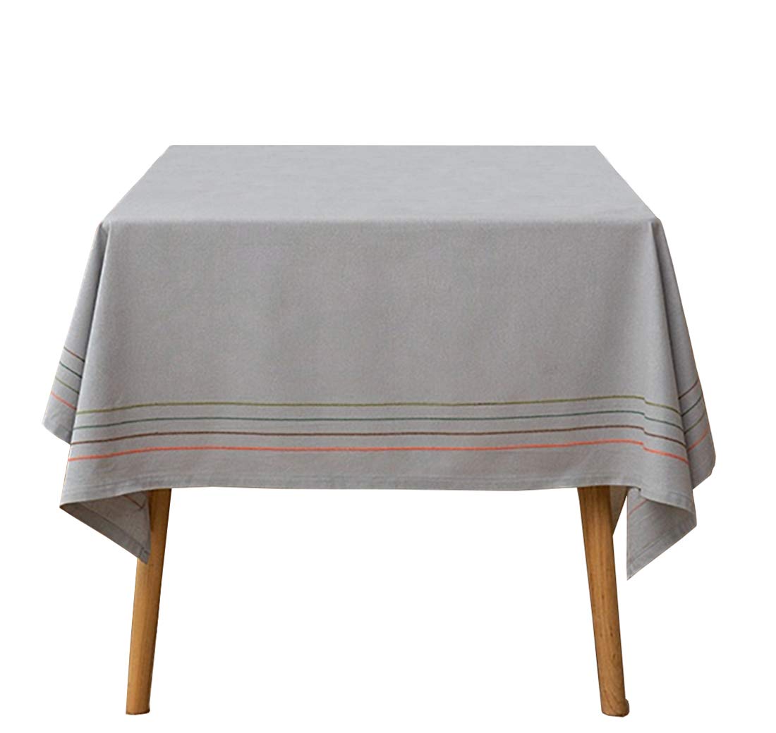 Cotton tablecloth with striped border and tassel trim, light grey woven fabric.