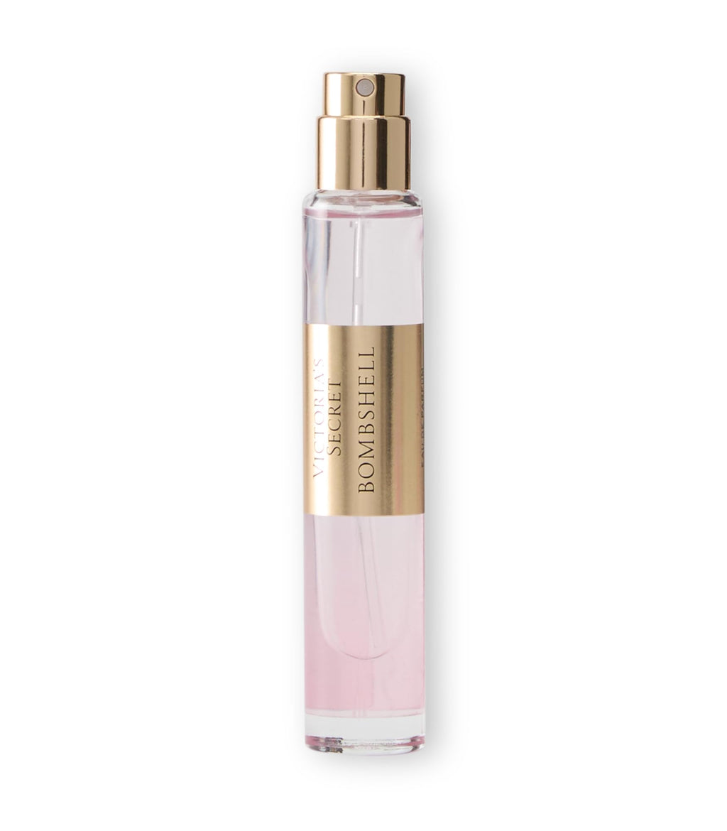 Victoria's Secret Bombshell mini eau de parfum travel spray, pink glass bottle close-up