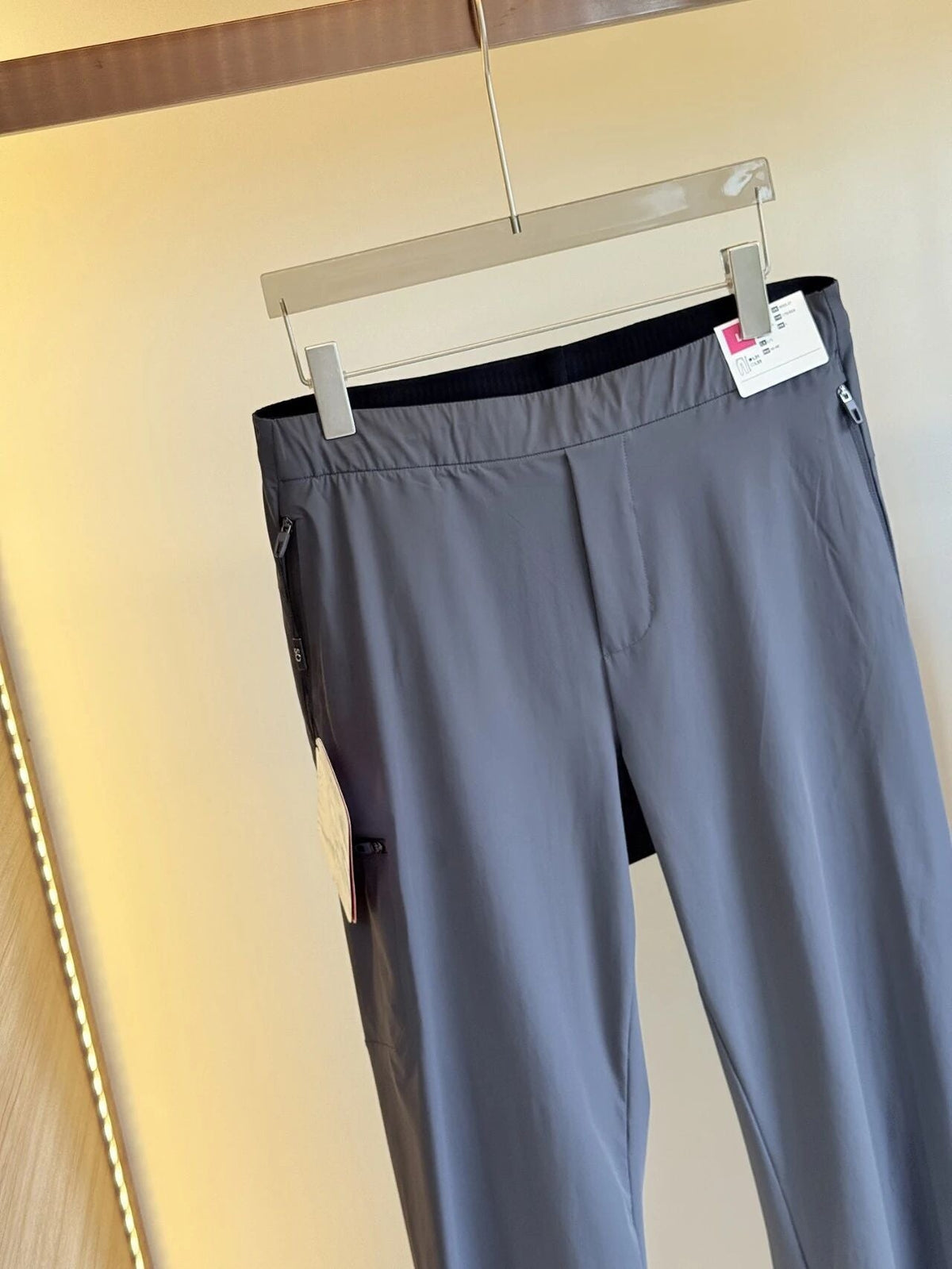 Men's quick-dry pants, dark gray with elastic waistband and zip pocket detail
