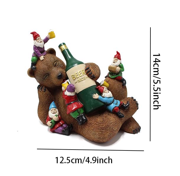 Garden bear yard statue with green beer bottle and multiple gnome figurines