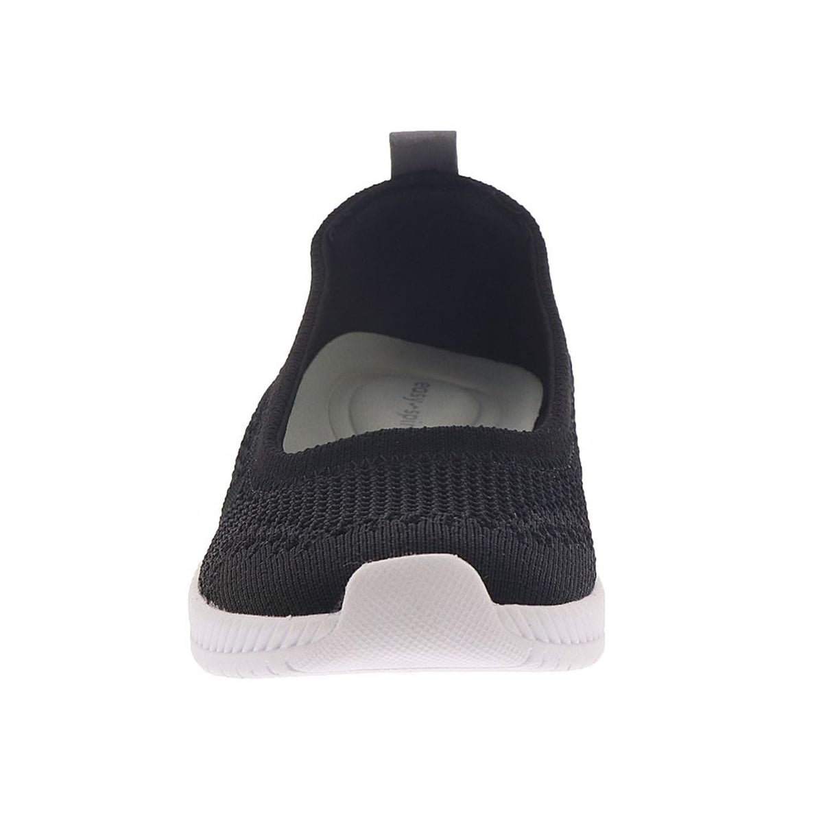 Women's slip-on sneaker heel view with black fabric upper and cushioned white midsole