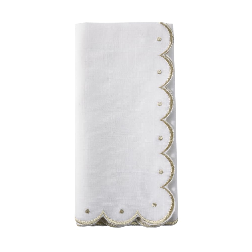 White embroidered scalloped cloth napkin with gold-trimmed edge, folded