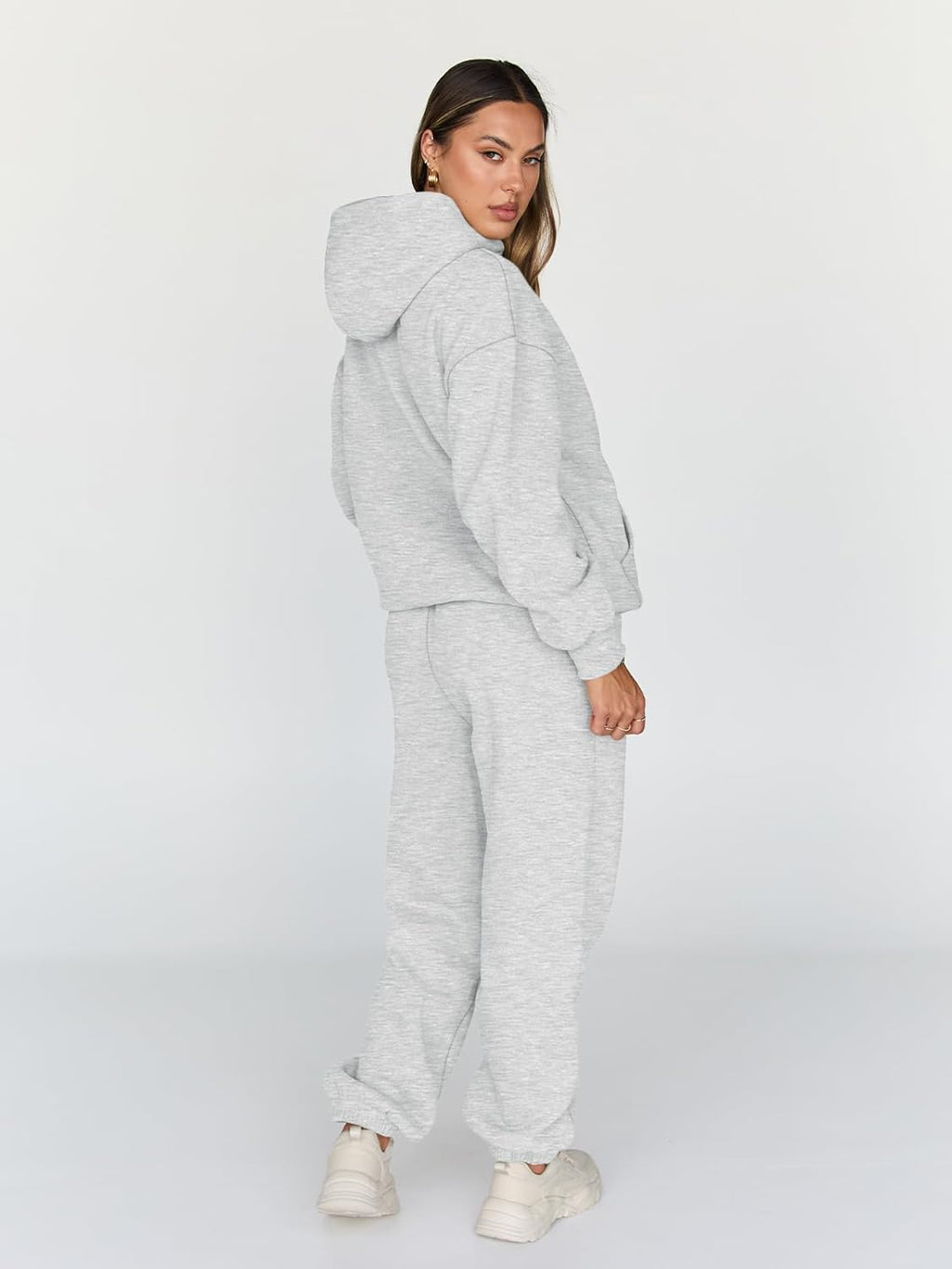 Light gray pullover hoodie and matching jogger sweatpants set, back/side view