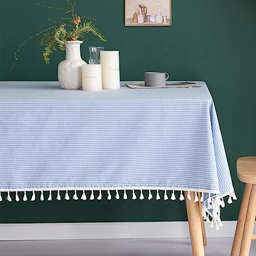 Light blue striped cotton-blend tablecloth with white tassel trim along edge, 55x55 in