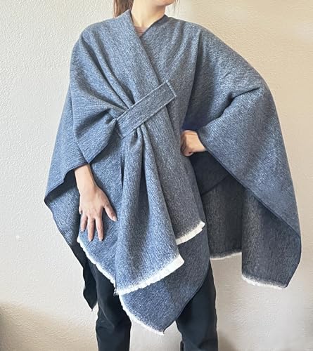 Women’s blue-grey fringe poncho shawl with open front and wrap-tie at the neckline, draped cape.