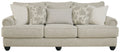 Fog sofa in light beige woven fabric with patterned and striped accent pillows