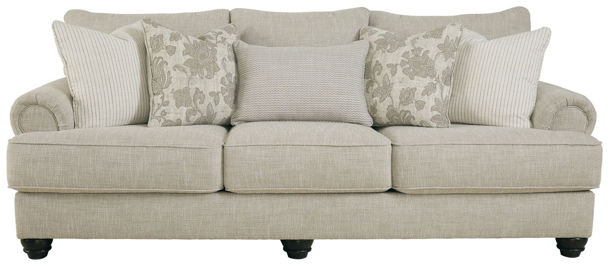 Fog sofa in light beige woven fabric with patterned and striped accent pillows