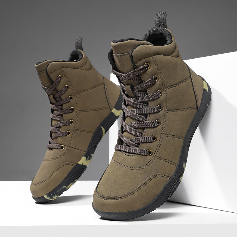 Men's tan high-top hiking shoes with lace-up front and grippy black outsole