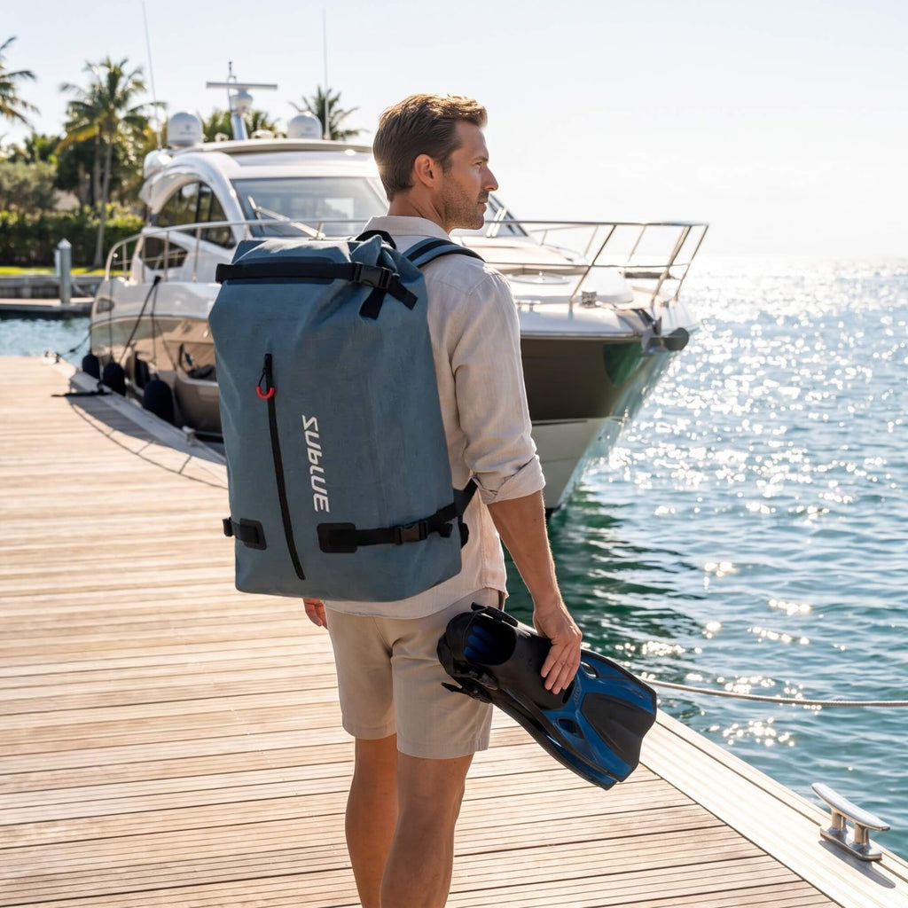 52L waterproof backpack in blue-gray with roll-top, side buckles, and shoulder straps