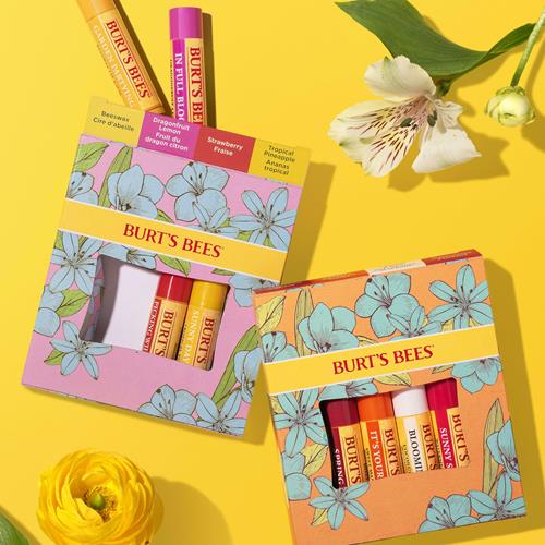 Floral lip balm gift set boxes with four colored balm tubes shown