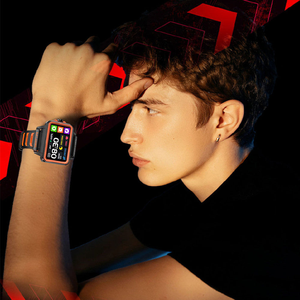 Smart watch worn on wrist with square screen, orange accents, and black-orange strap