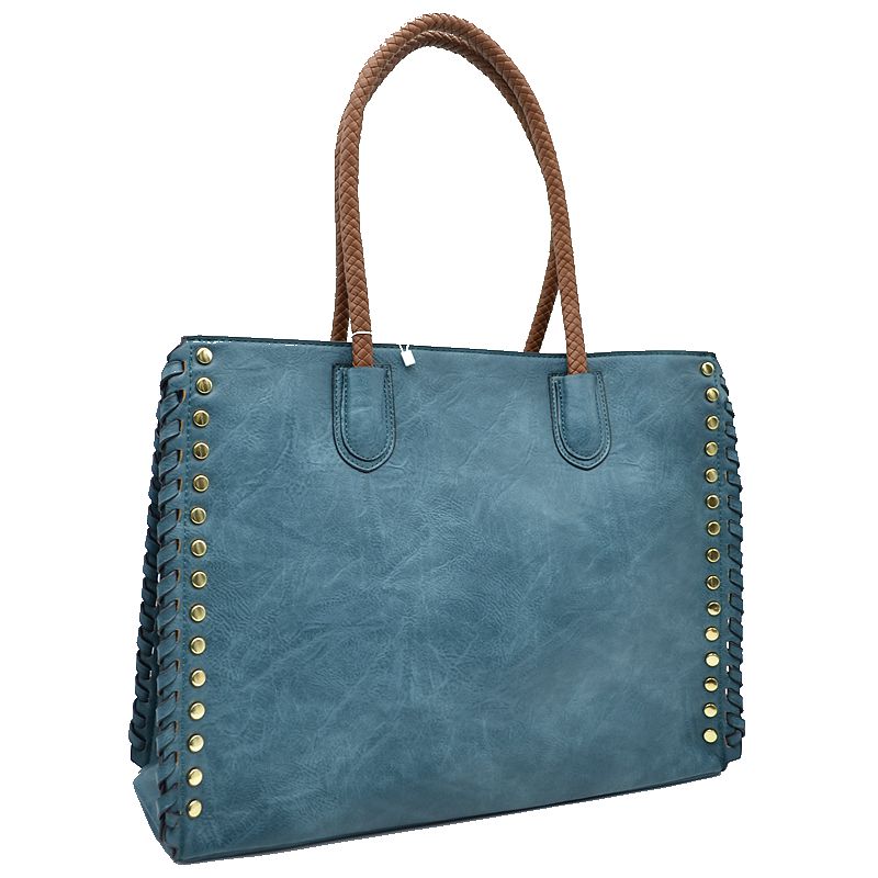 Blue faux leather tote with gold stud accents, whipstitch trim, and twin top handles