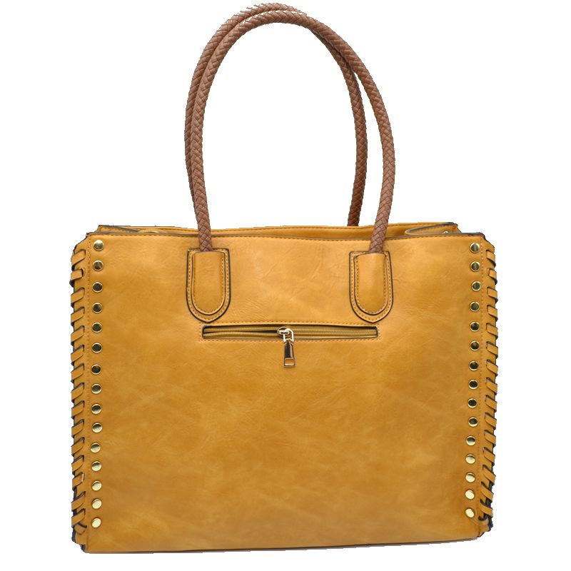 Mustard faux leather tote bag with front strap, central zipper, studded trim, two handles