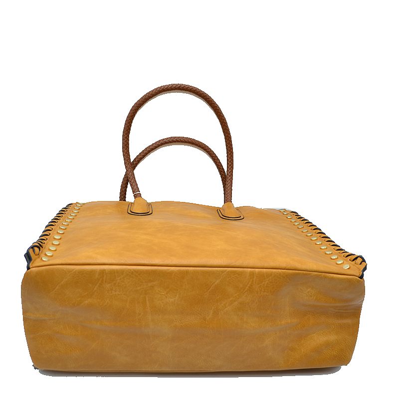 Tan faux leather tote bag with studded edges, whipstitch trim, and double top handles