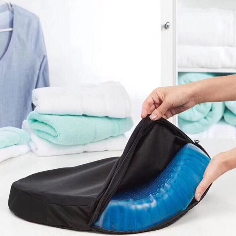 Light blue gel seat cushion folded in black storage bag