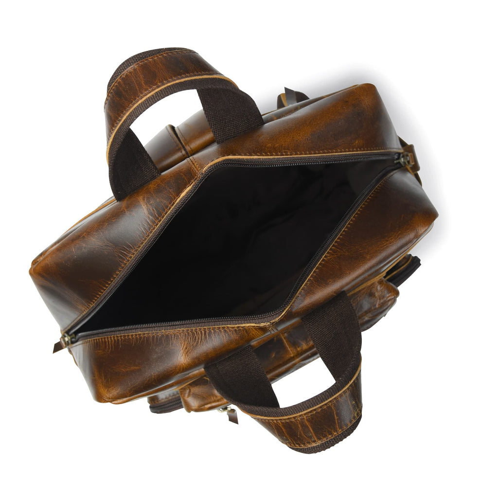 Brown leather backpack open top view with interior lining and zippered front panel