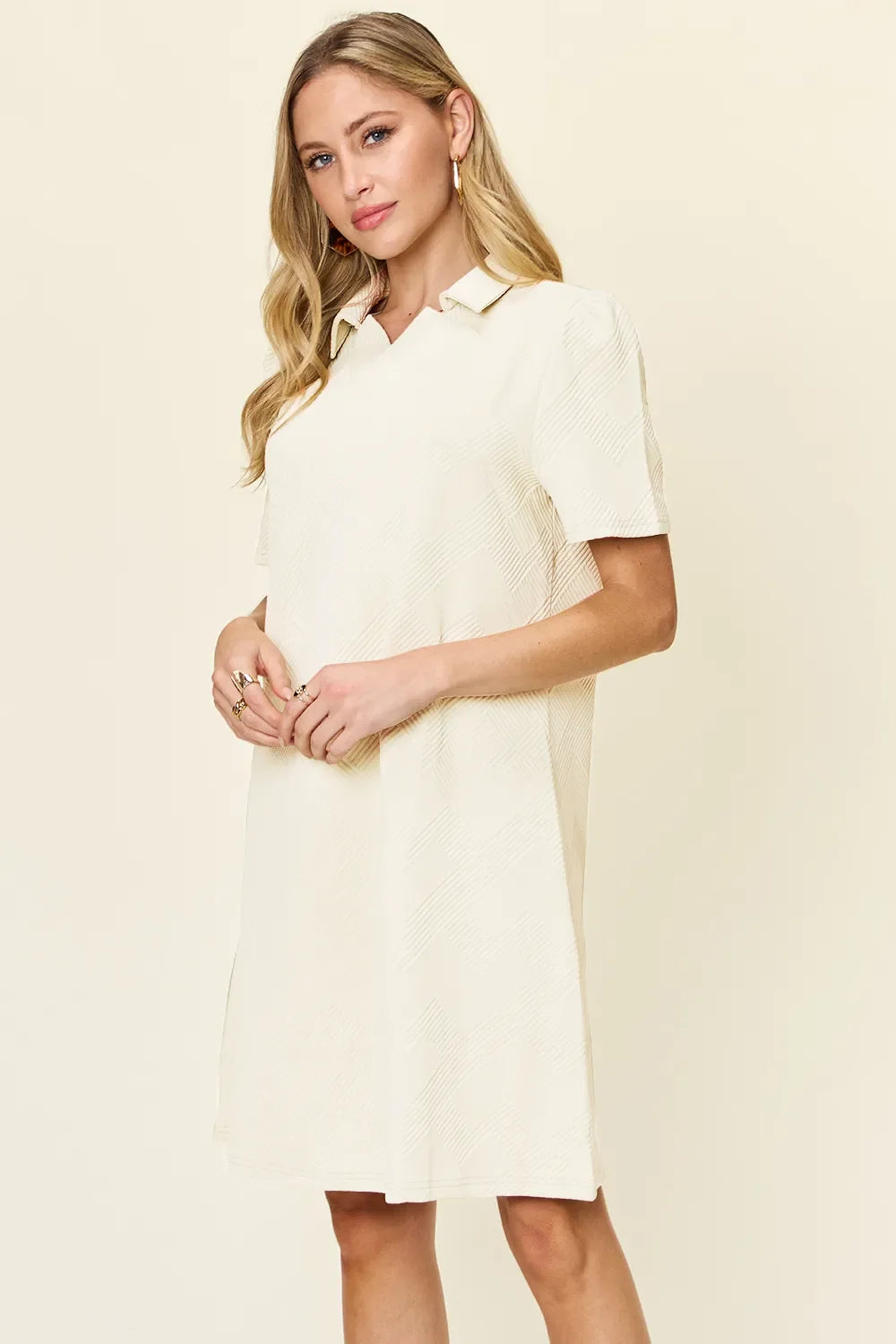 Cream textured collared short-sleeve dress, above-knee length, side slit detail