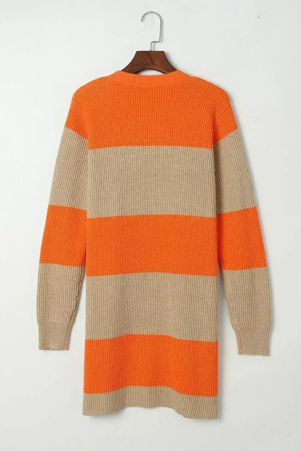 Back view of orange and beige colorblock ribbed knit cardigan with long sleeves
