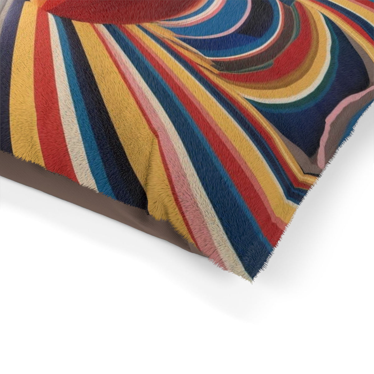 Close-up of multicolor striped plush pet bed corner with soft fringed edge