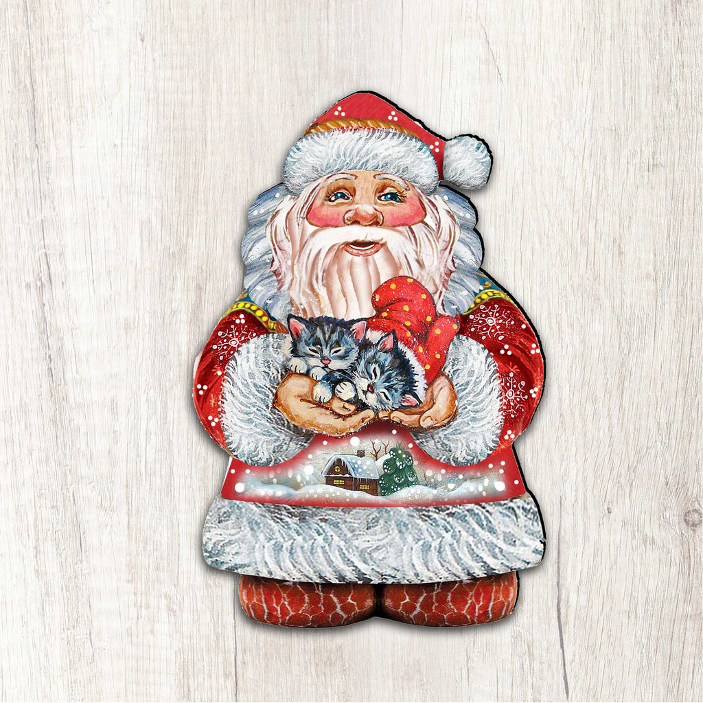 Santa holding a kitten Christmas door decor figure on a light wood wall