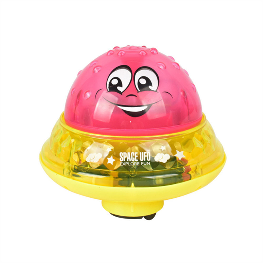 Pink and yellow smiling UFO water sprinkler toy with dome and base