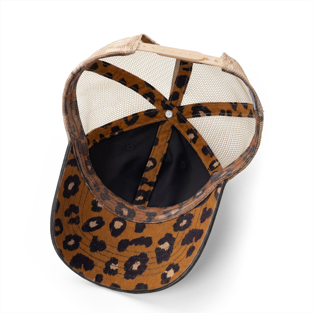 Leopard-print ponytail cap with tan mesh back and adjustable strap