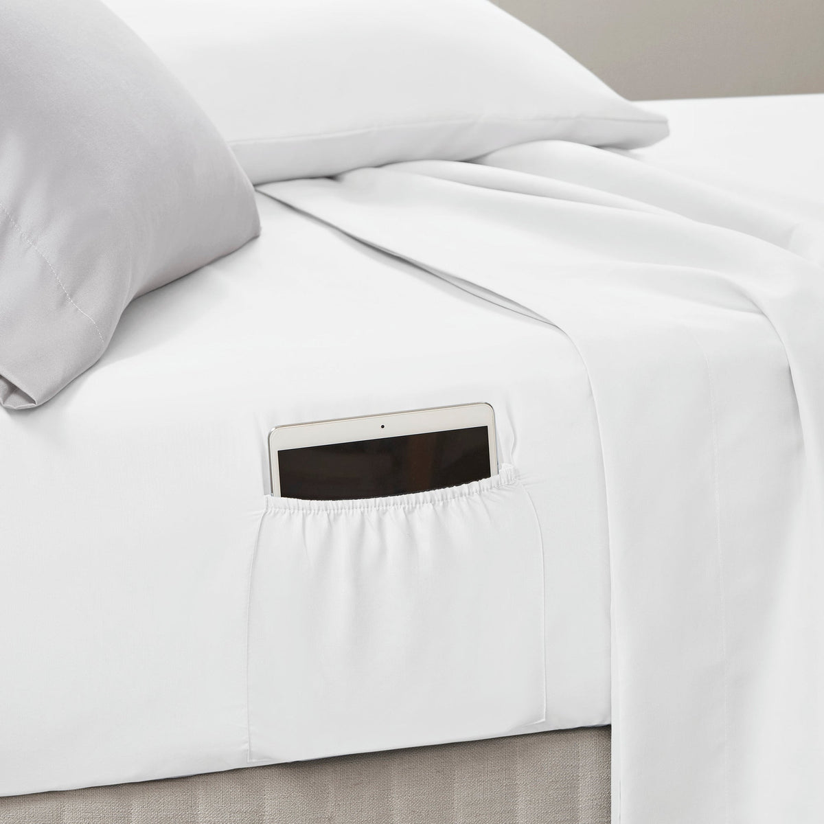 Twin XL white fitted sheet with stitched edge and rectangular pocket opening