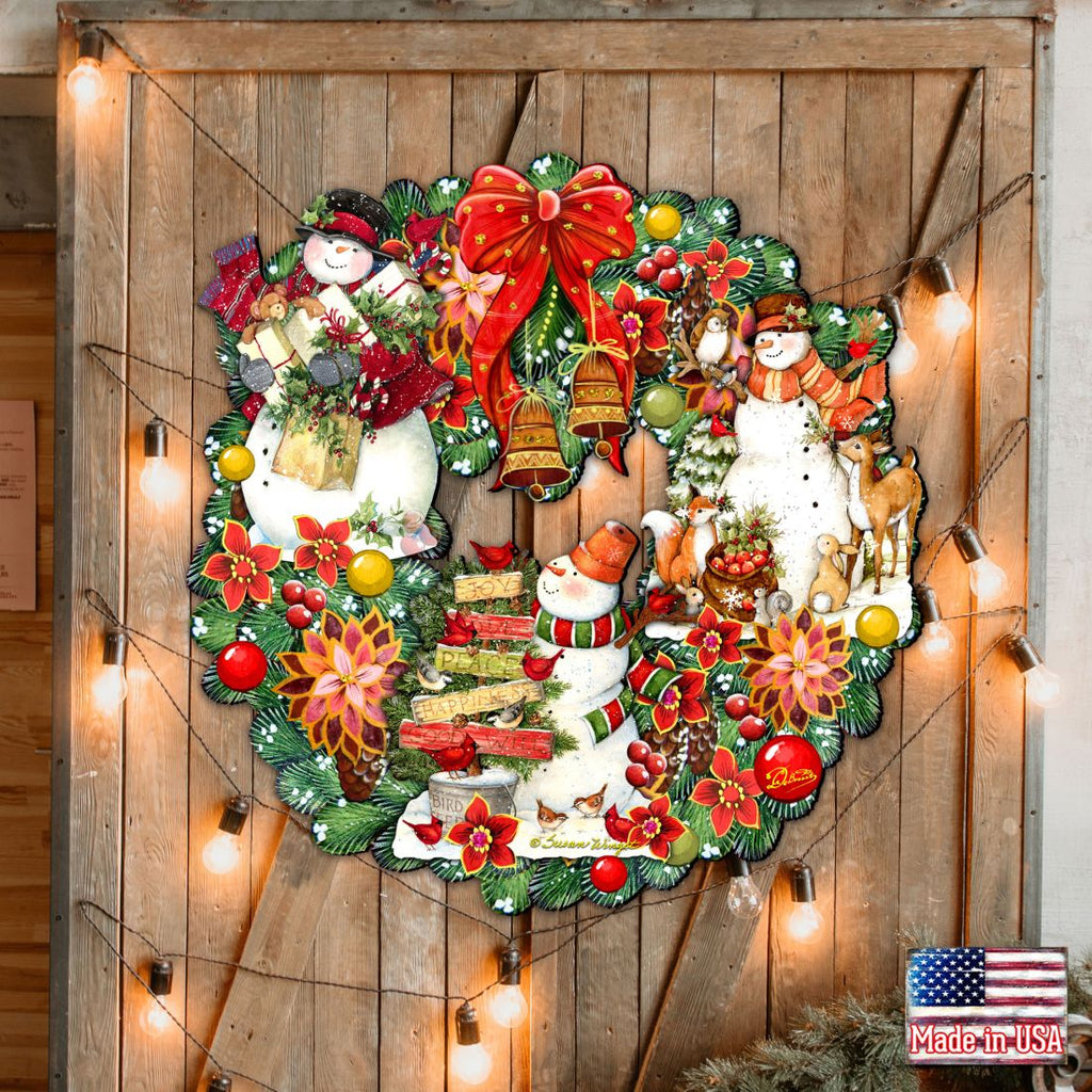 Christmas wreath featuring Santa, snowman, reindeer, red ornaments, and poinsettias