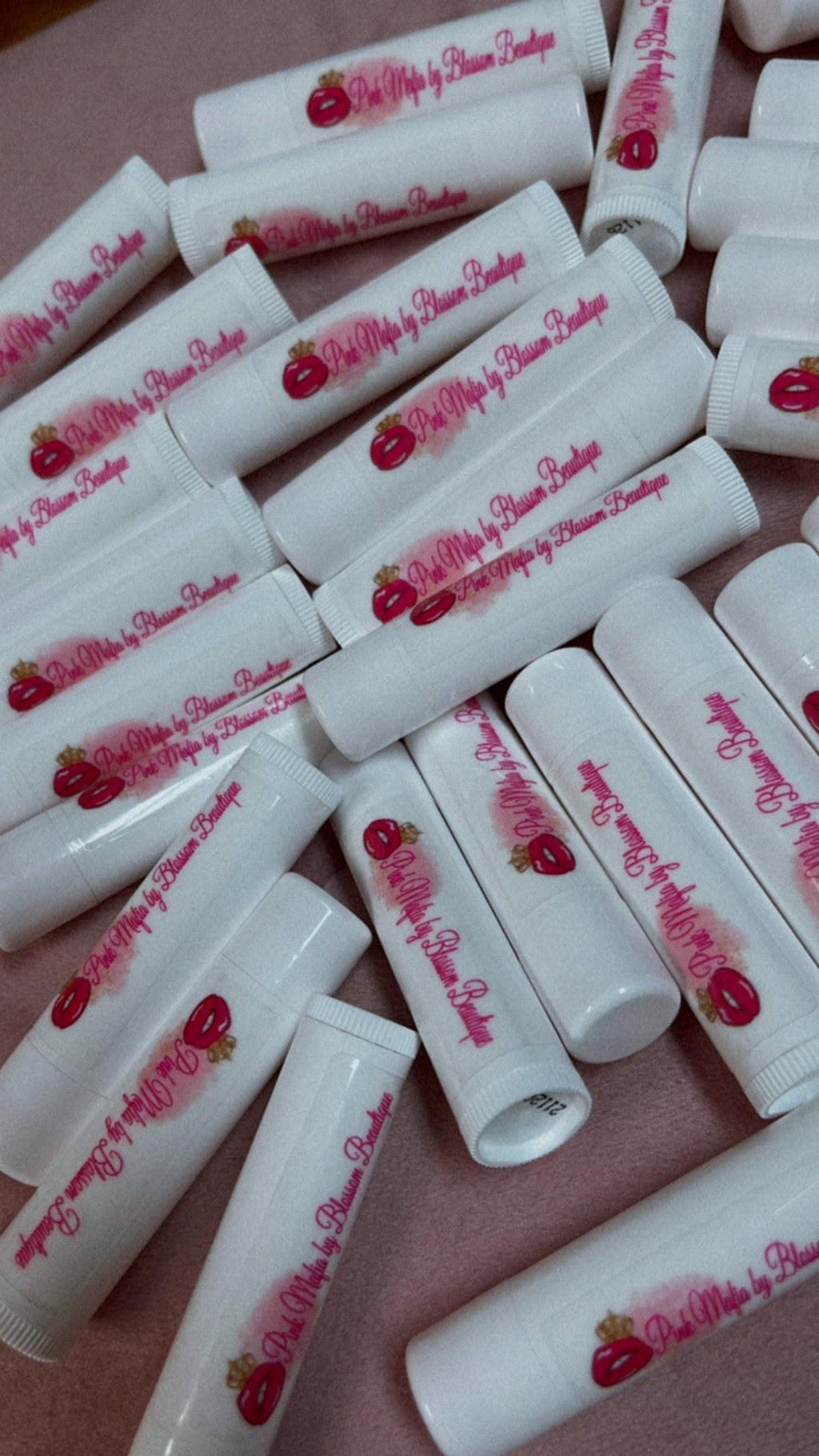 Cherry lip balm chapstick set of white tubes with pink-red cherry logo