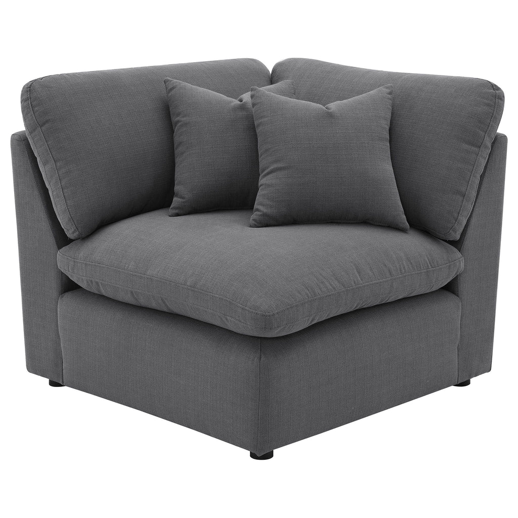 Charcoal upholstered corner sofa section with two seat cushions and armrests