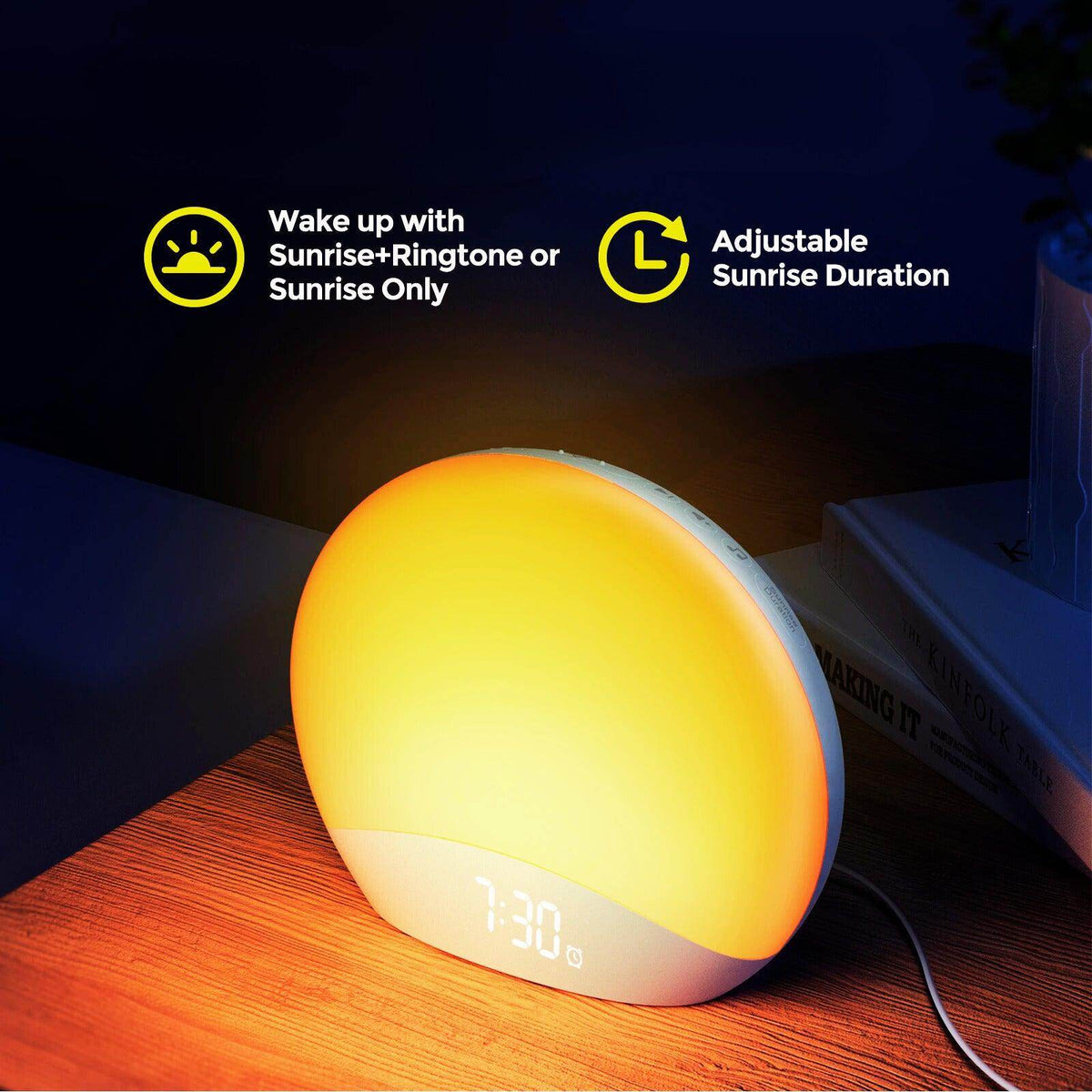 Sunrise alarm clock on bedside table with bright yellow sunrise light
