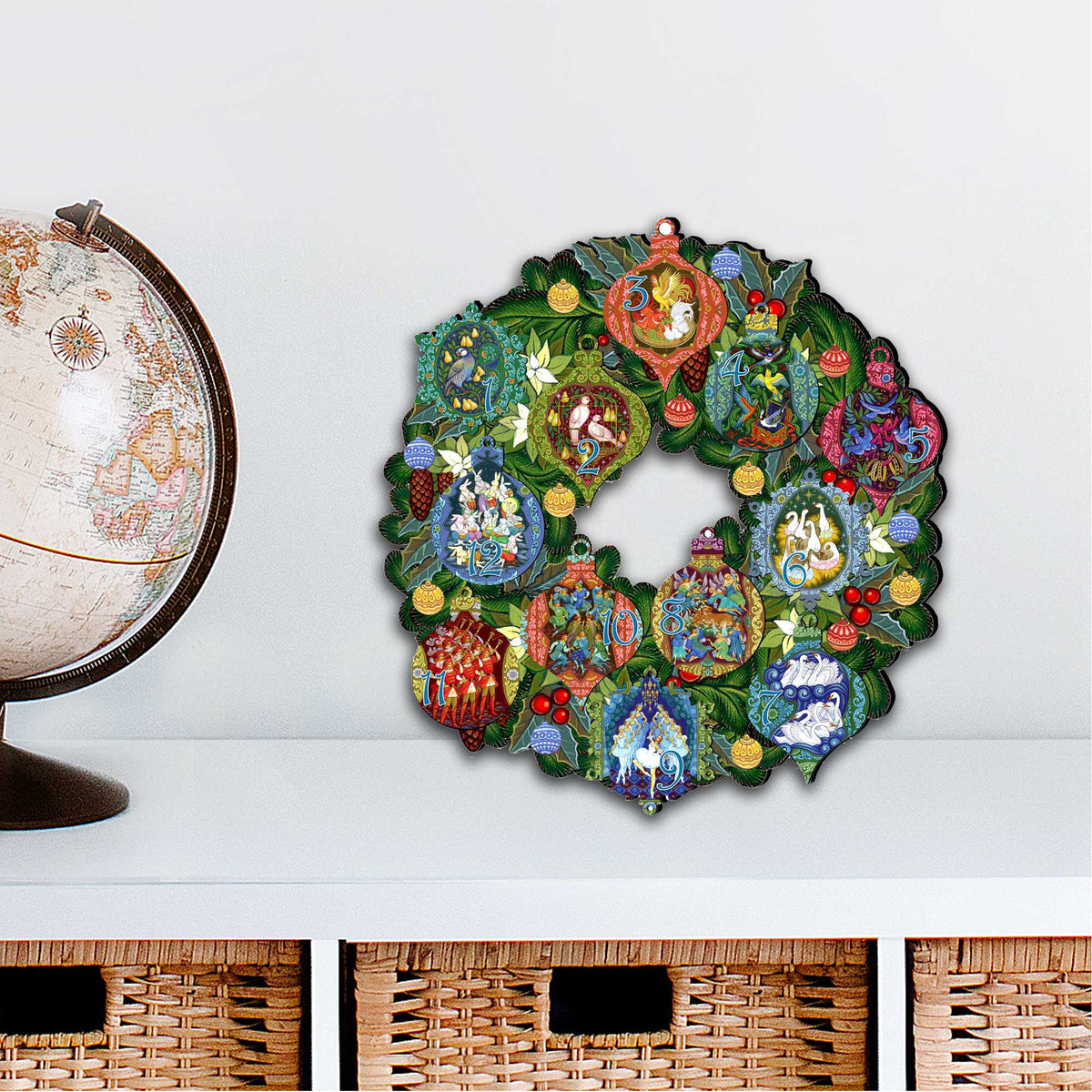 12 Days of Christmas door wreath with colorful numbered ornaments and green foliage center