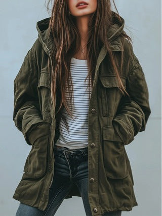 Green hooded parka-style windbreaker jacket with front snap buttons