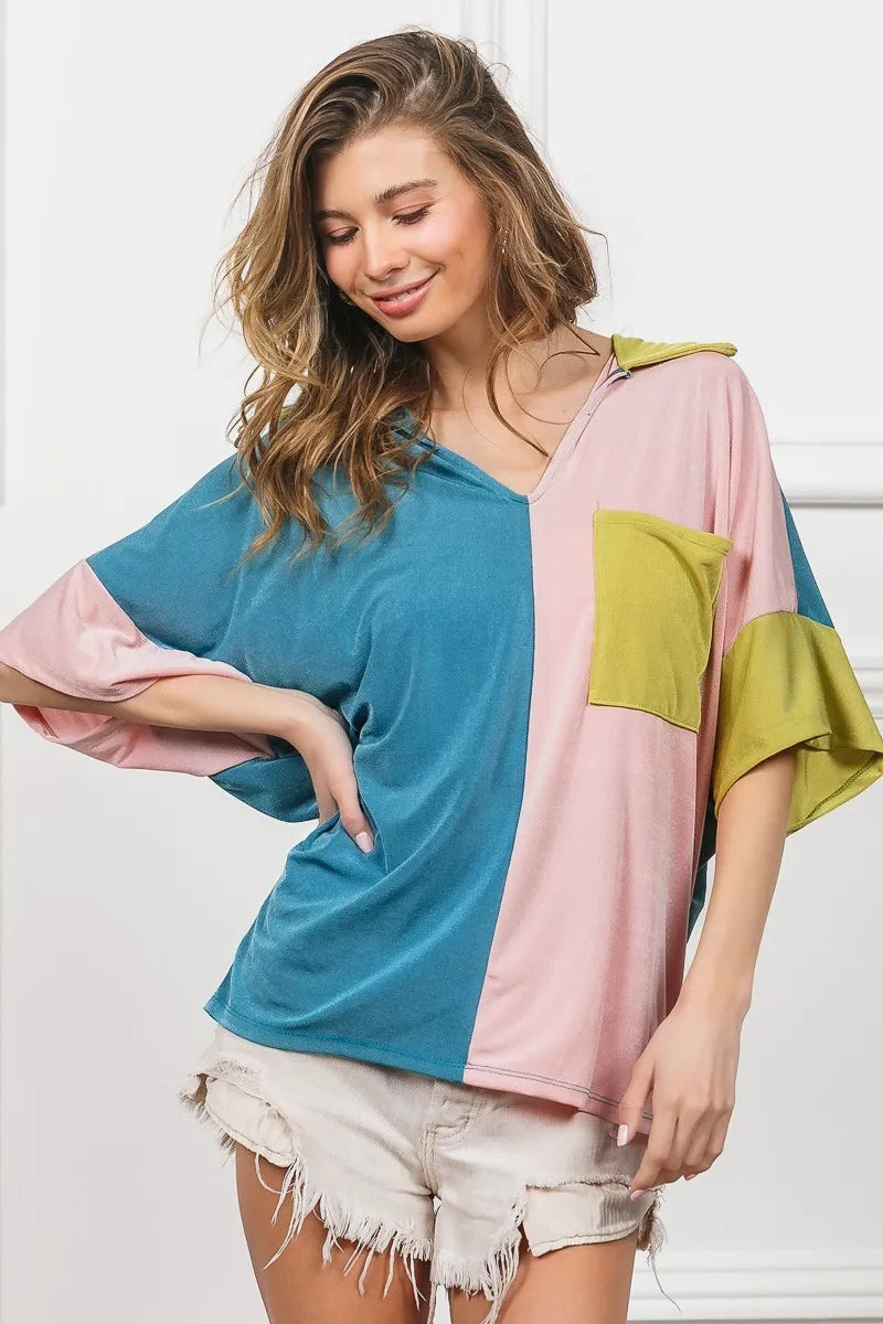 Color-block V-neck slinky knit top with chest pocket, teal, pink, and green sleeves