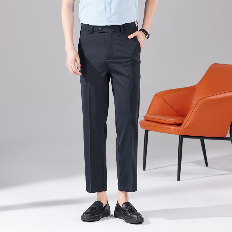 Navy dress trousers, high waist with belt loops and straight tapered legs
