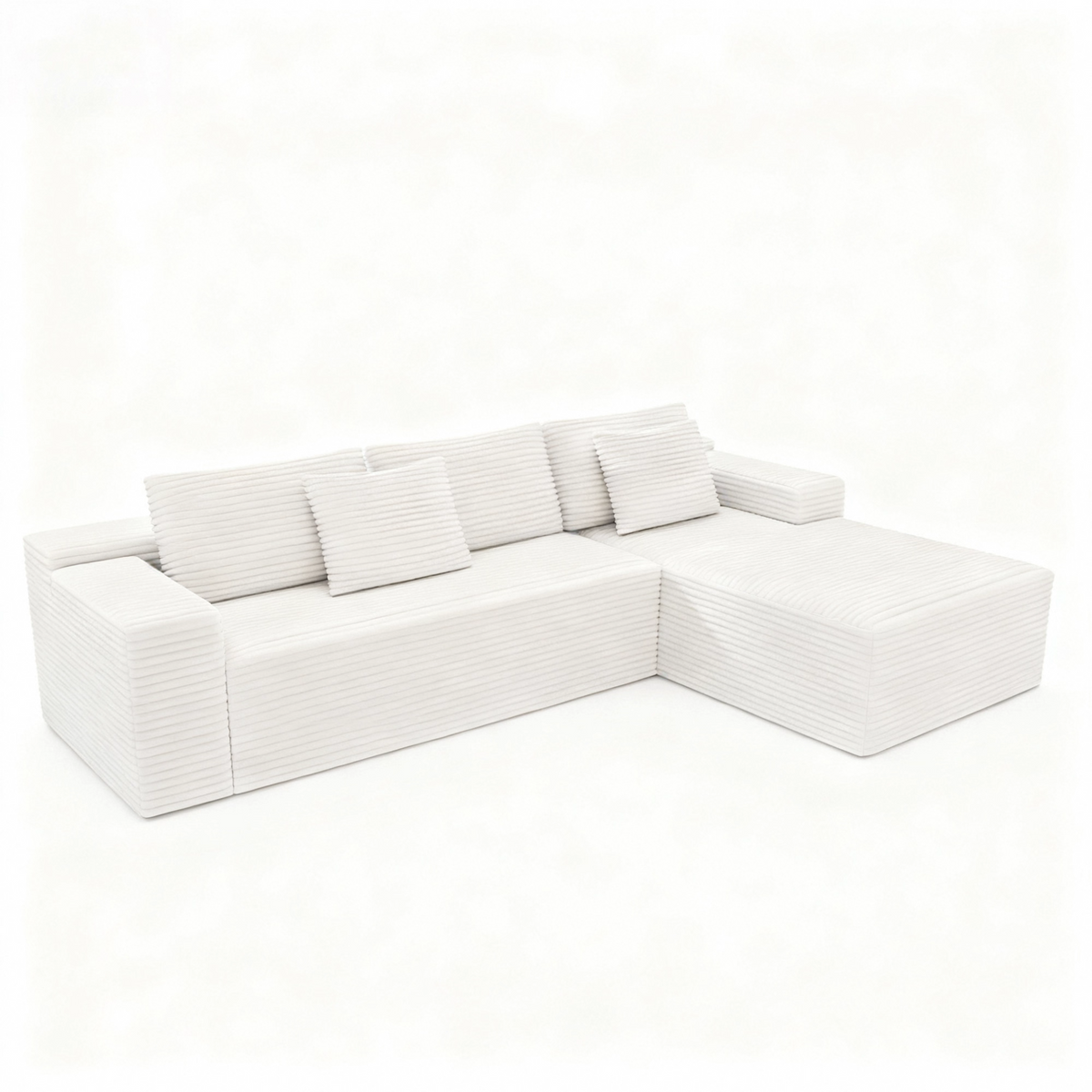 White modular sectional sofa seat in plush upholstery, L-shaped layout with multiple pillows