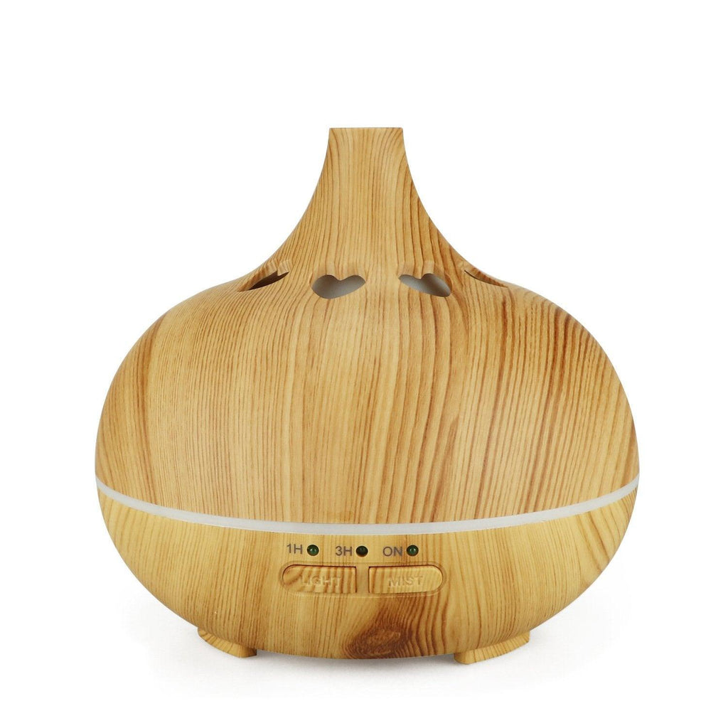 Wood-grain aromatherapy diffuser with heart-shaped air vents and LED control panel