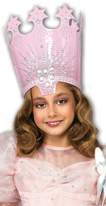 Pink jeweled crown with star cutouts, worn on head