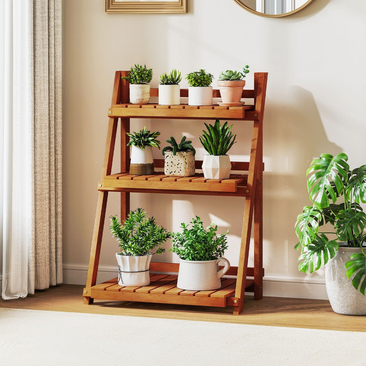 Three-tier folding wood plant stand with wide shelves for potted plants