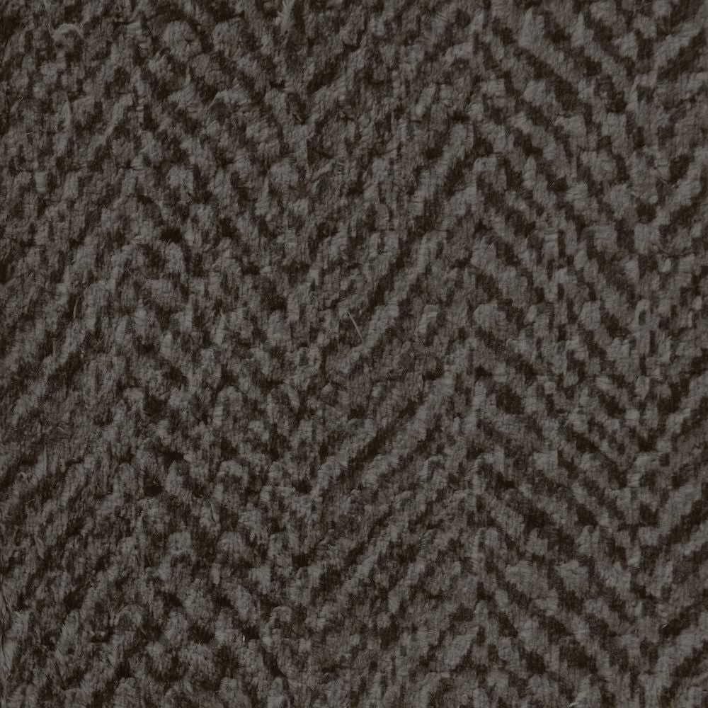 Dark upholstery fabric swatch with tight houndstooth pattern texture