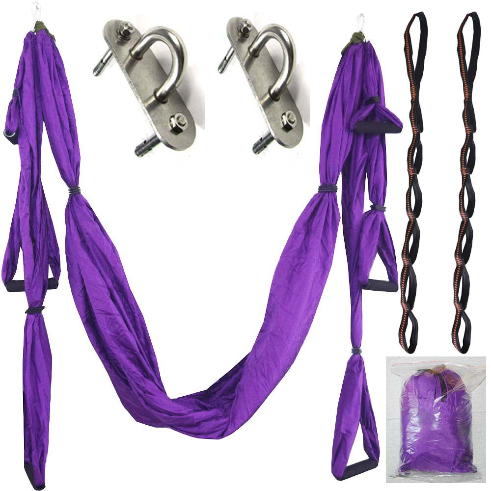 Purple aerial yoga hammock swing with metal carabiners and hanging straps