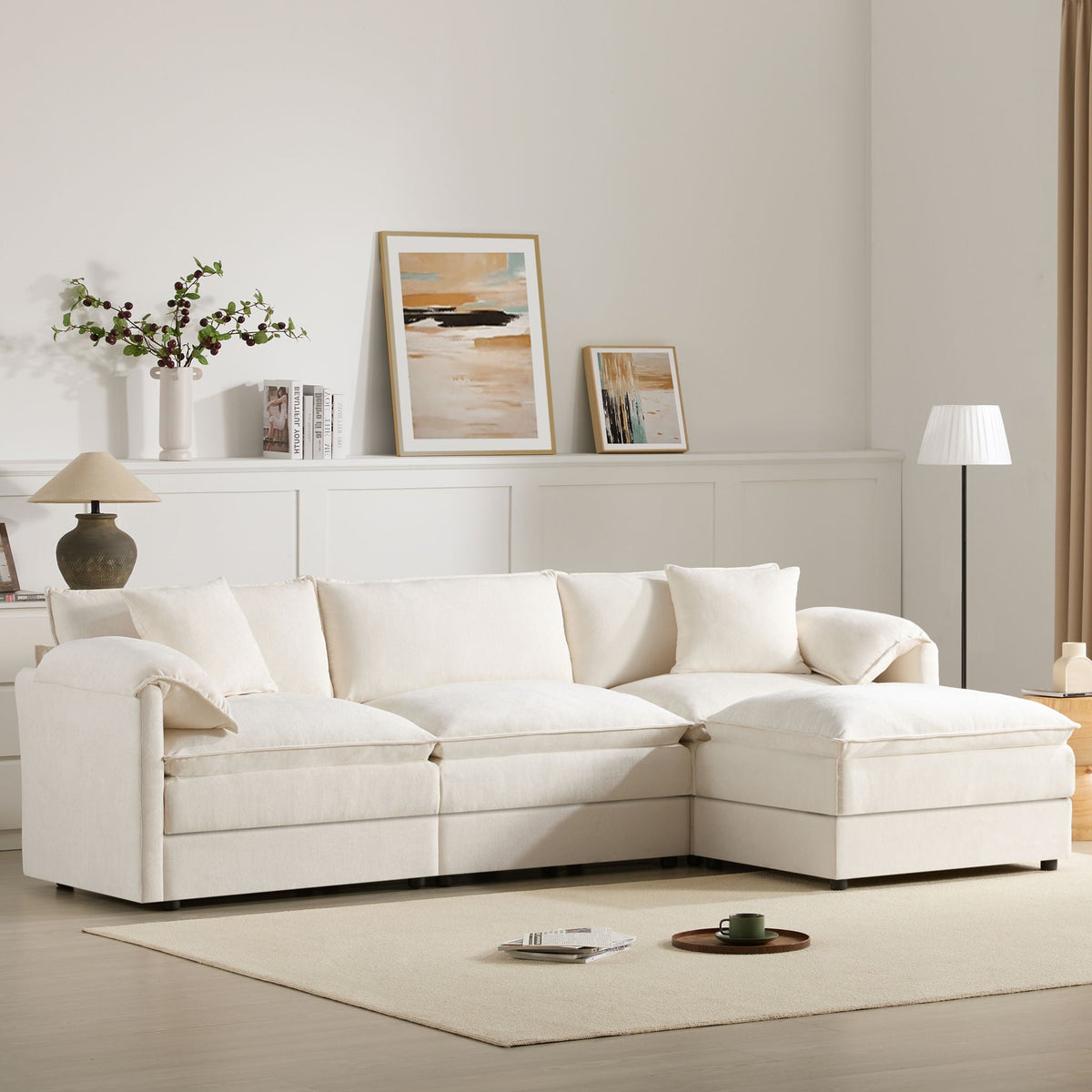 Beige sectional sofa with right chaise, deep seat cushions, and padded back pillows