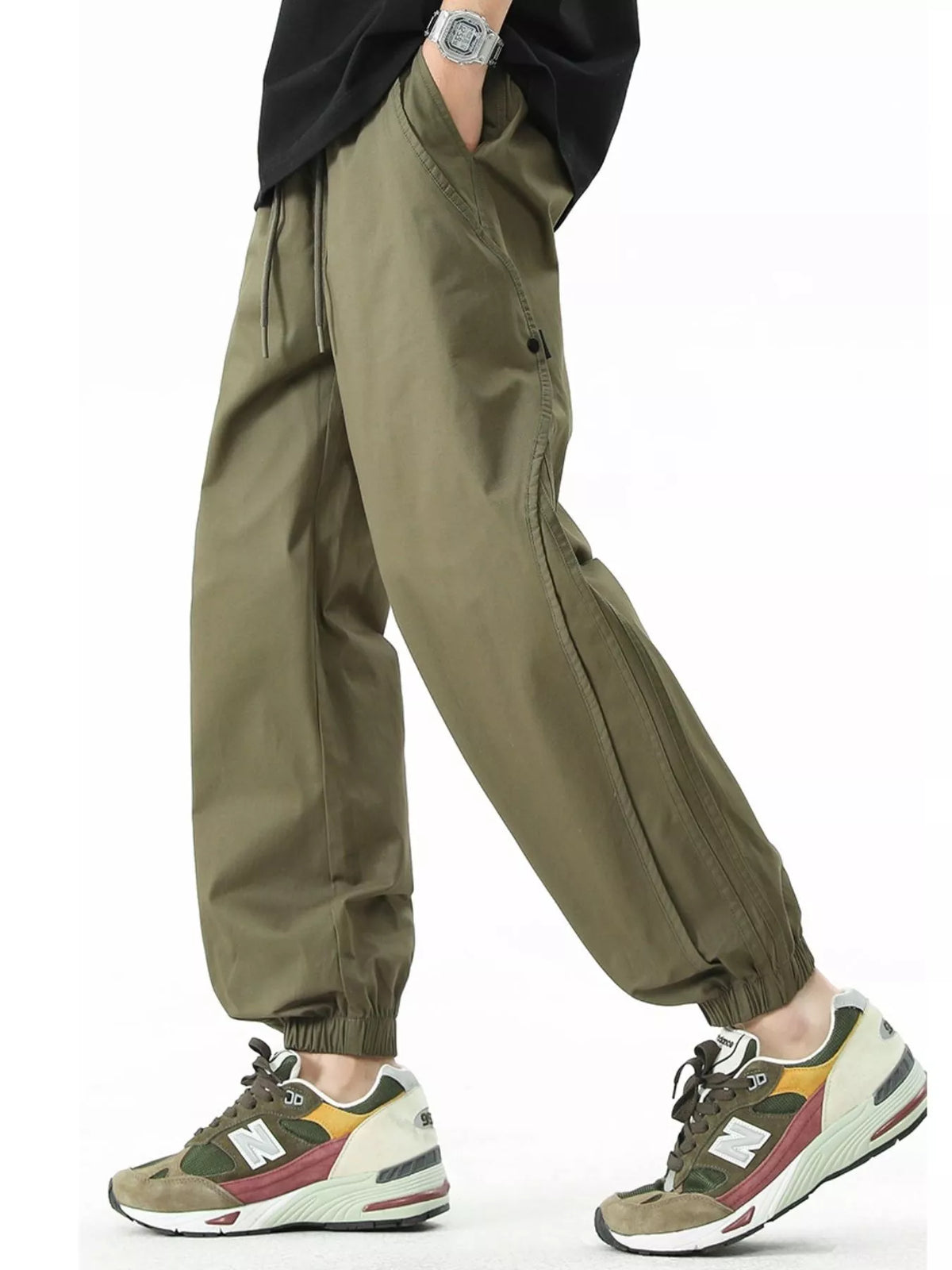 Moss loose-fit casual pants with drawstring, elastic waist and ankle cuffs, side pockets