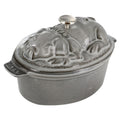 Staub pig cocotte in graphite gray enameled cast iron with matching lid, oval 1 qt