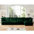 Green L-shape sectional sofa with chaise, ribbed slipcover, plush back and seat cushions.