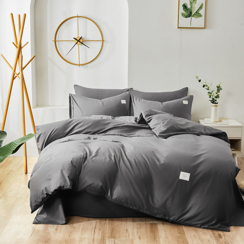 Gray bedding set with matching pillowcases and duvet cover