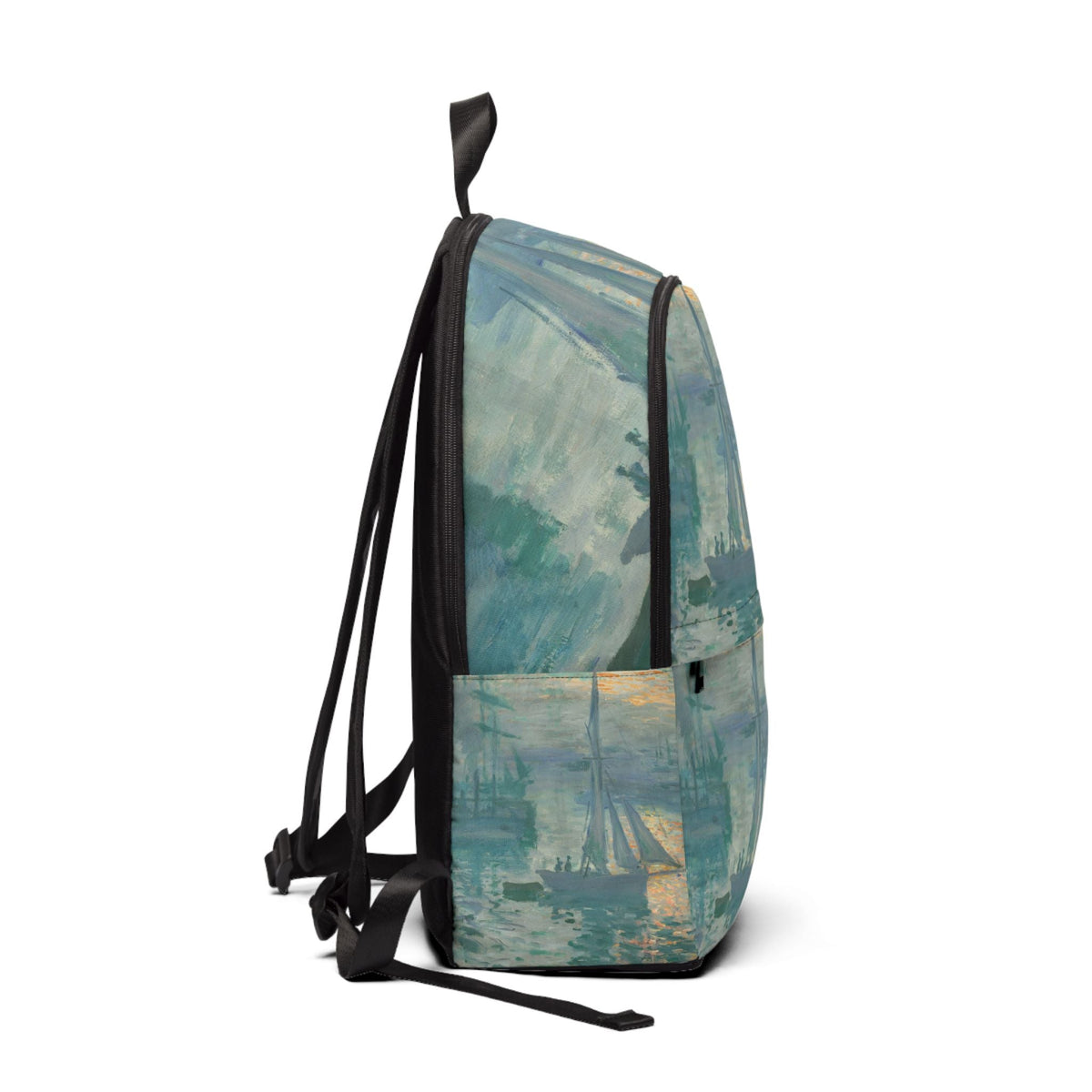 Side view of ocean art fabric backpack with black shoulder straps and handle